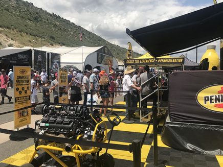people lined up at a booth