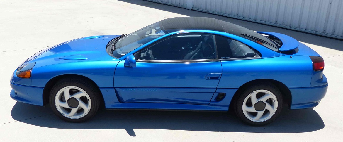 Side view of blue Dodge Stealth