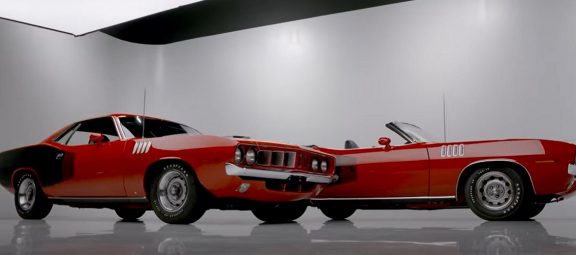 two rally red '71 HEMI 'Cudas